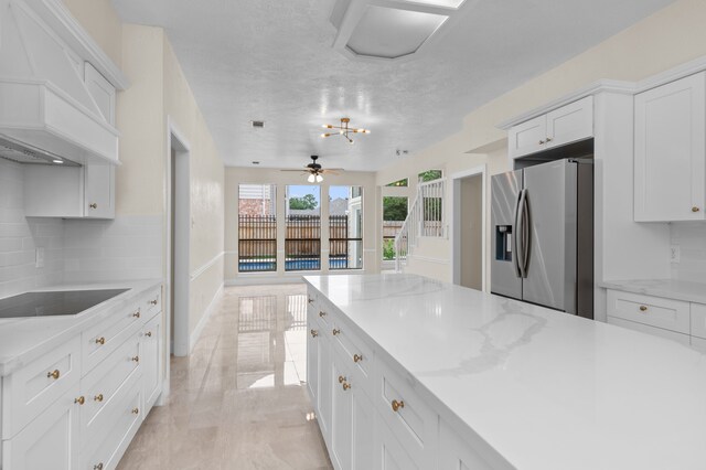 17402 Wilton Park Ct, Spring, TX 77379 - kitchen featuring custom range hood, stainless steel fridge with ice dispenser, light tile flooring, black electric stovetop, and tasteful backsplash
