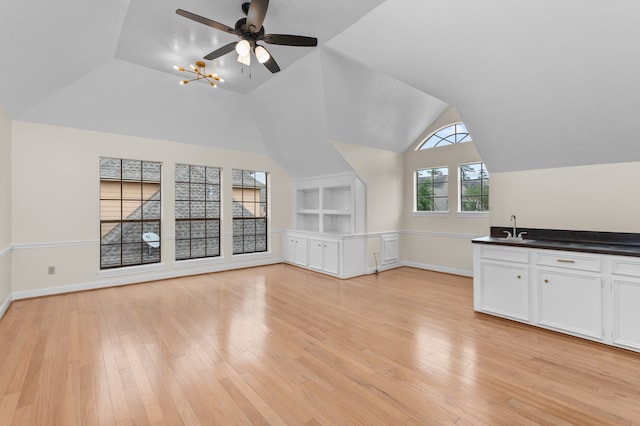 17402 Wilton Park Ct, Spring, TX 77379 - additional living space with ceiling fan, light hardwood / wood-style flooring, built in shelves, sink, and lofted ceiling