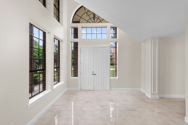17402 Wilton Park Ct, Spring, TX 77379 - entryway with a high ceiling and light tile floors