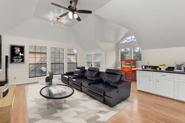 17402 Wilton Park Ct, Spring, TX 77379 - living room with sink, lofted ceiling, light wood-type flooring, and ceiling fan