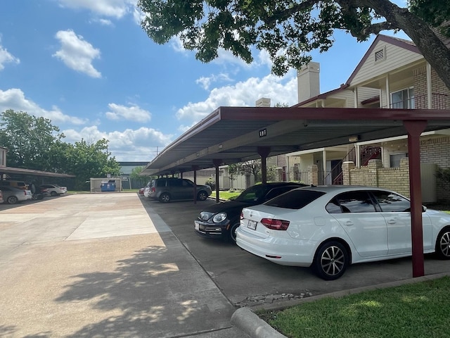 view of car parking featuring a carport