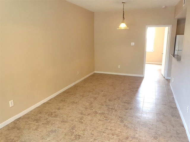 view of tiled empty room