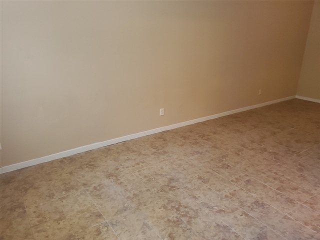 view of tiled spare room