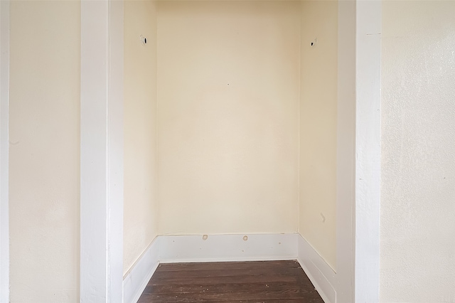 washroom with hardwood / wood-style floors