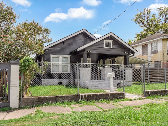 bungalow with a front yard