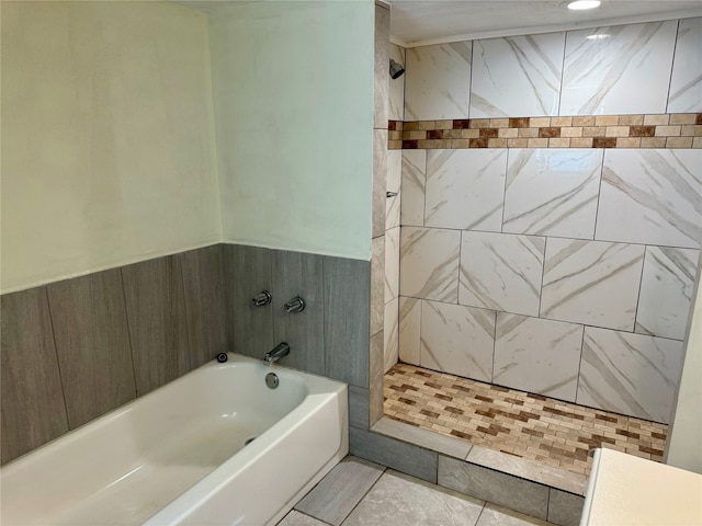 bathroom featuring tiled shower and tile flooring