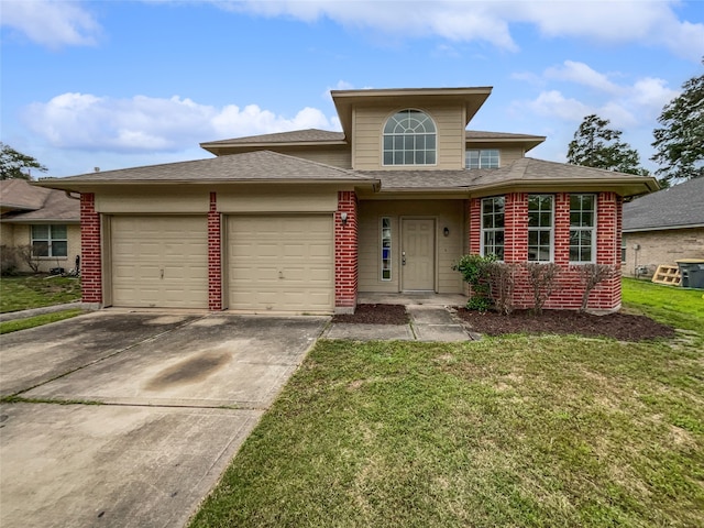 view of front of property featuring a garage and a front yard