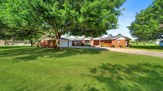 single story home featuring a garage and a front lawn