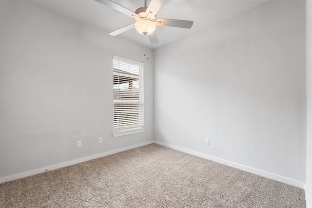 empty room with carpet and ceiling fan