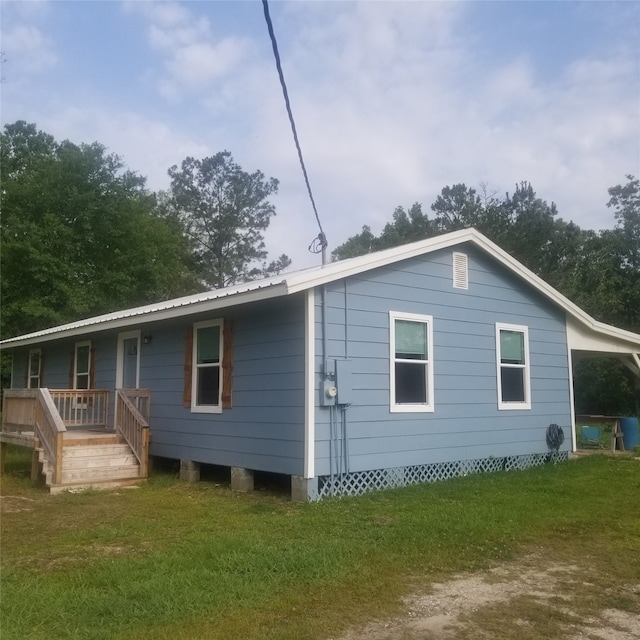 exterior space with a yard