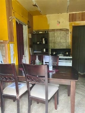 dining room with concrete flooring