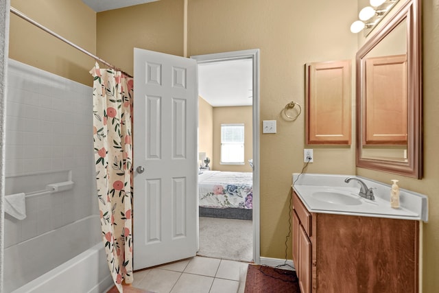 bathroom featuring tile floors, shower / bath combo with shower curtain, and large vanity