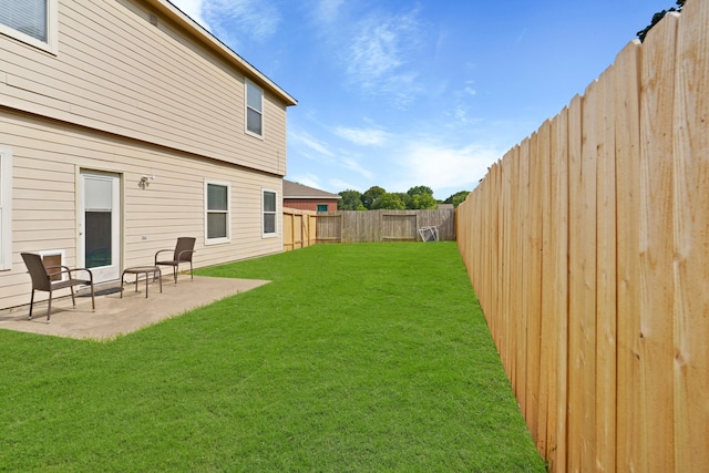 view of yard with a patio area