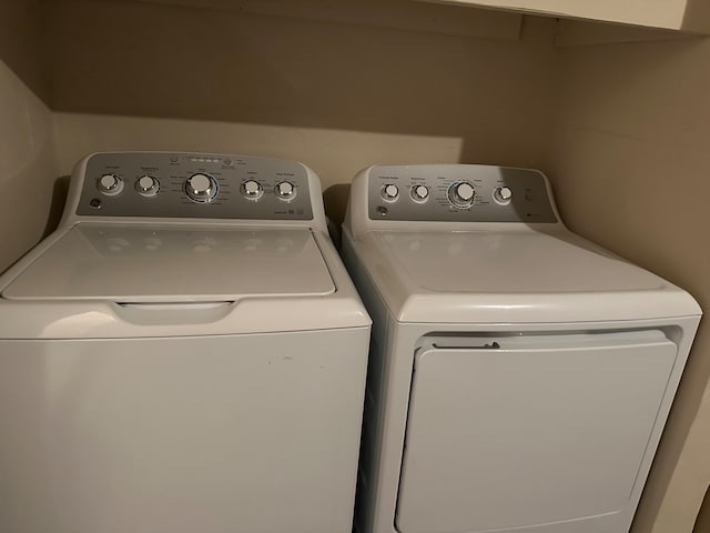 laundry room with washer and clothes dryer