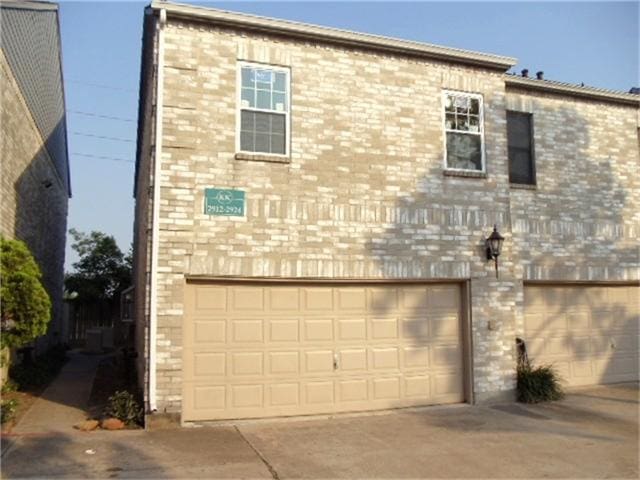 exterior space with a garage