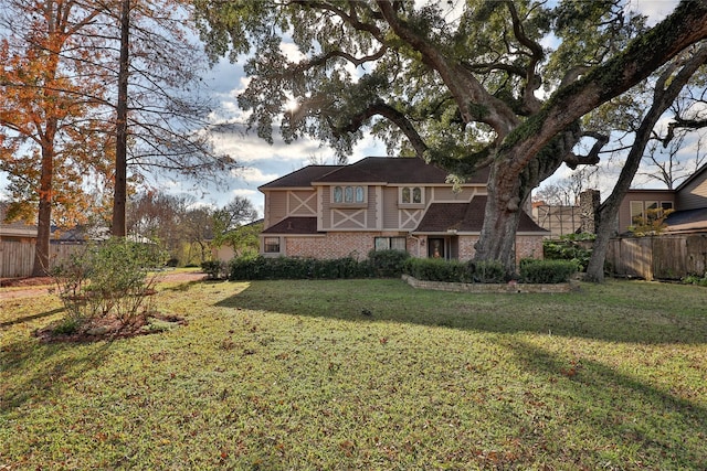 back of house with a yard