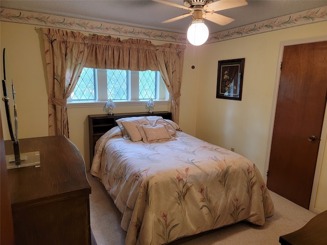 bedroom with carpet and ceiling fan