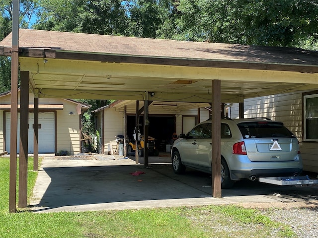 view of parking / parking lot featuring a garage and a carport