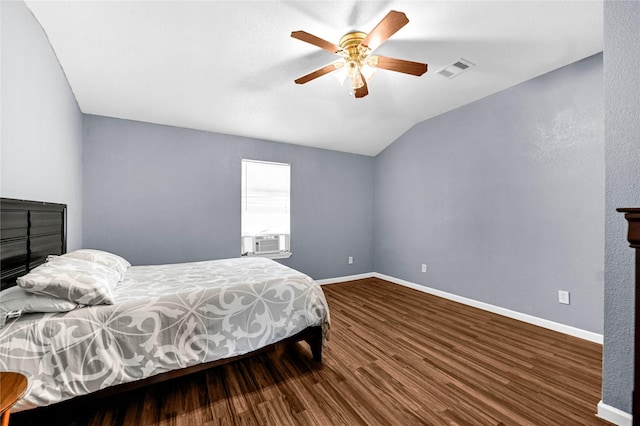 bedroom featuring lofted ceiling, cooling unit, hardwood / wood-style flooring, and ceiling fan