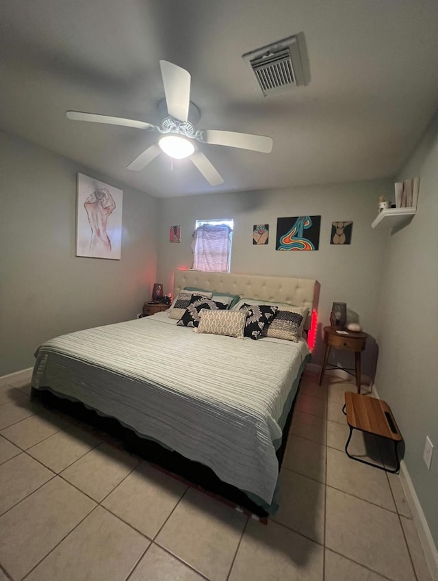 bedroom featuring light tile patterned flooring and ceiling fan