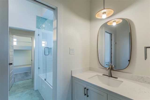 bathroom featuring tile floors, bath / shower combo with glass door, and oversized vanity