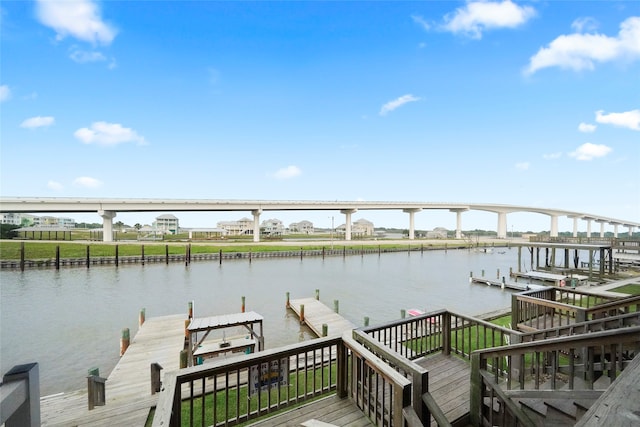 dock area with a water view