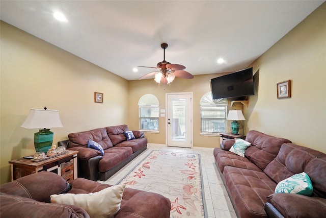 living room with tile flooring and ceiling fan