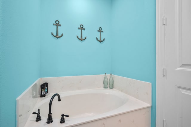 bathroom with a bath to relax in