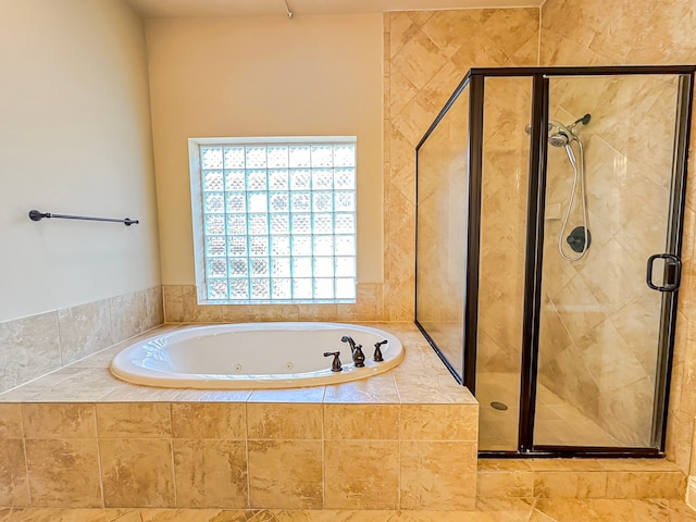 bathroom featuring plus walk in shower