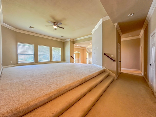 hall featuring carpet and crown molding