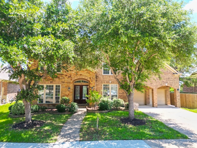 view of front of property with a garage