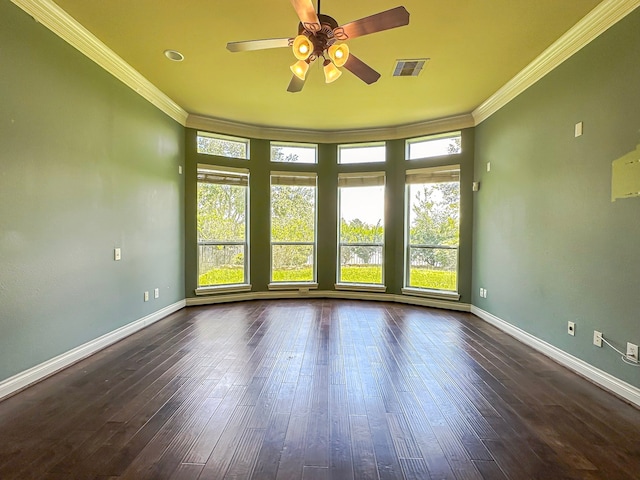 unfurnished room with dark wood-type flooring, ceiling fan, and crown molding