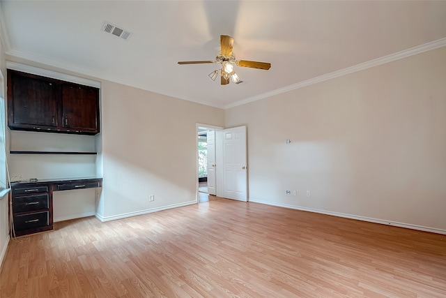 unfurnished room featuring ceiling fan, light hardwood / wood-style flooring, and crown molding