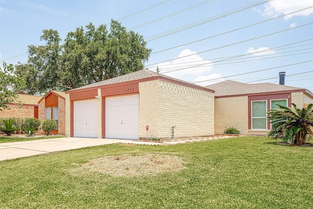 garage with a yard