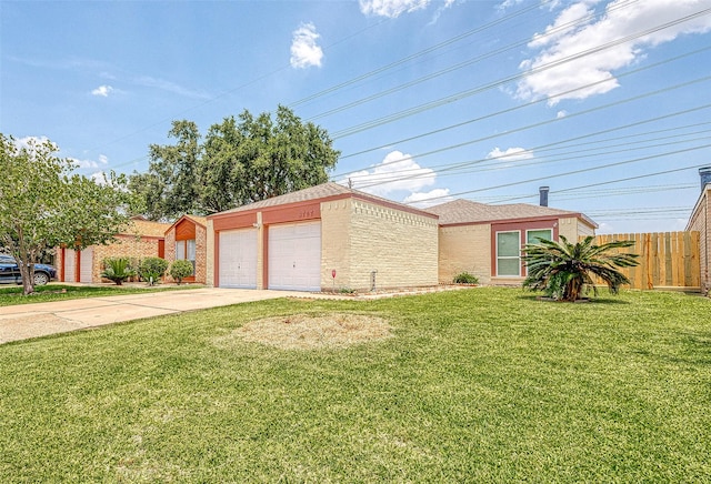 view of front facade featuring a garage and a front yard