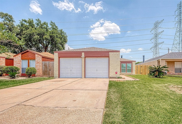 garage featuring a yard