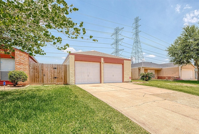 garage with a yard