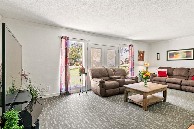 carpeted living room with a textured ceiling, ornamental molding, and french doors