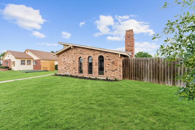 exterior space with a lawn