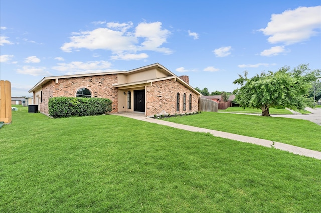 ranch-style house with a front yard