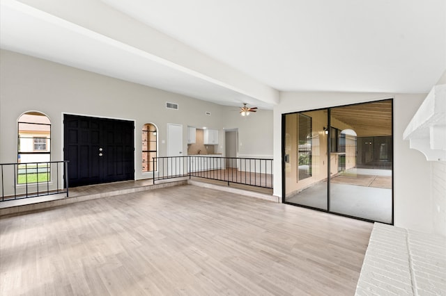 interior space with ceiling fan and light hardwood / wood-style floors