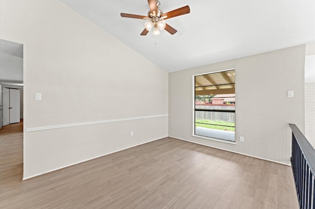 unfurnished living room featuring wood-type flooring, ceiling fan, and vaulted ceiling