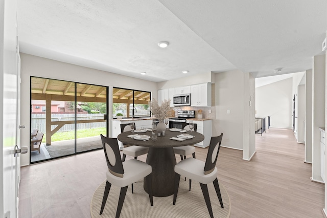 dining area featuring light hardwood / wood-style floors