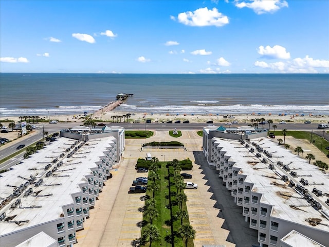 bird's eye view with a view of the beach and a water view