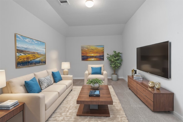 living room with light carpet and vaulted ceiling