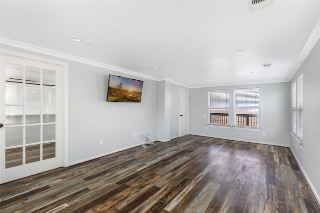 unfurnished living room with dark hardwood / wood-style flooring and ornamental molding