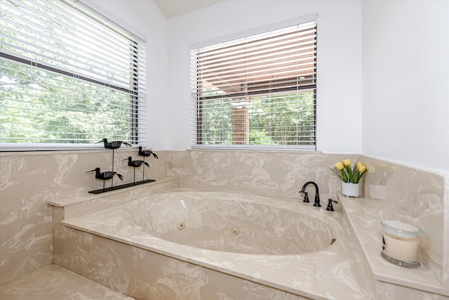 bathroom featuring a tub