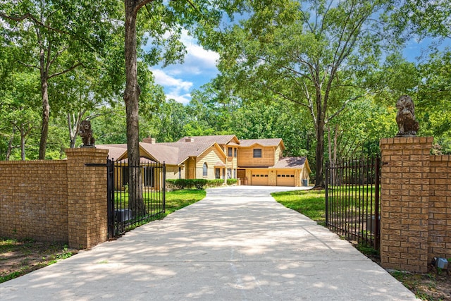 view of gate featuring a garage