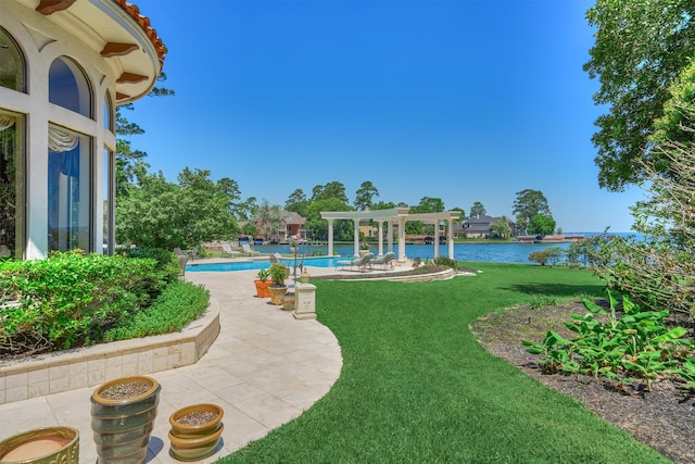 view of yard with a pergola and a patio area