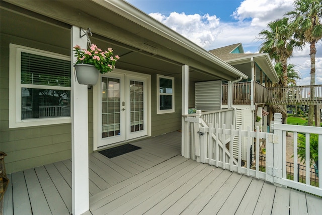 wooden terrace featuring french doors